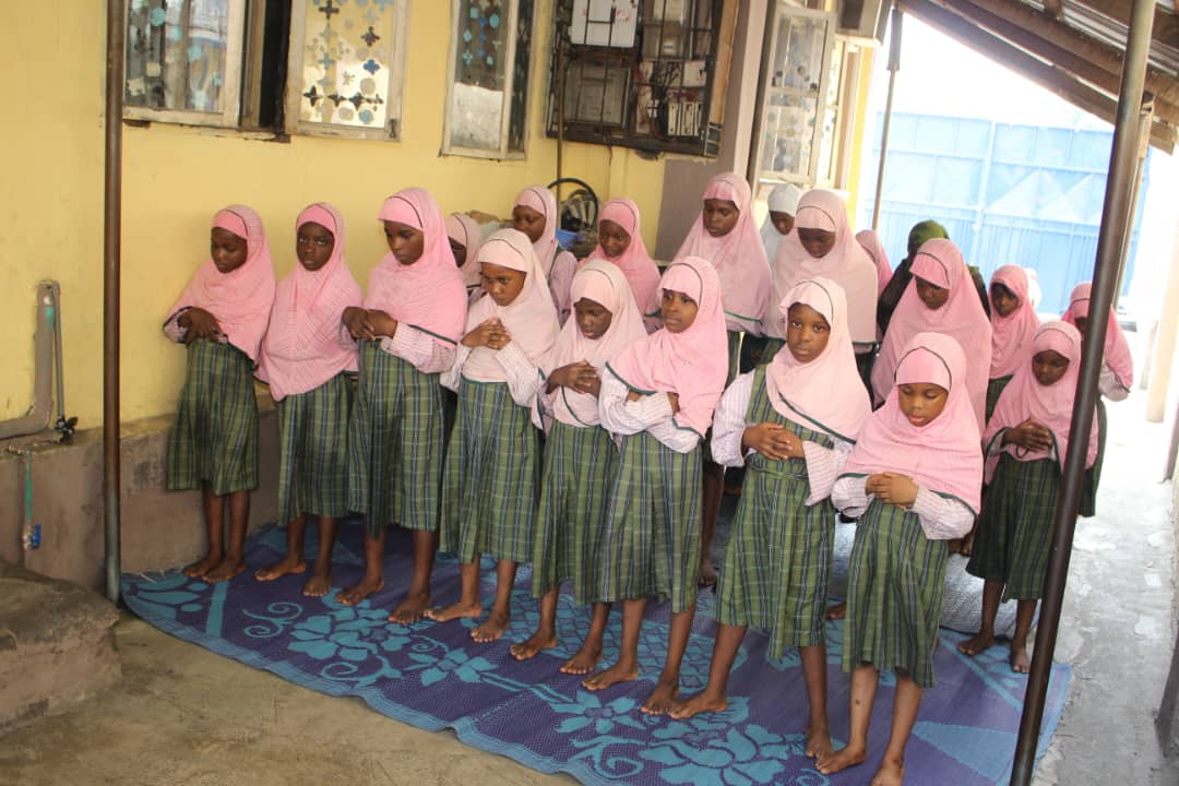 Girls standing for salah at Fareedah Children School